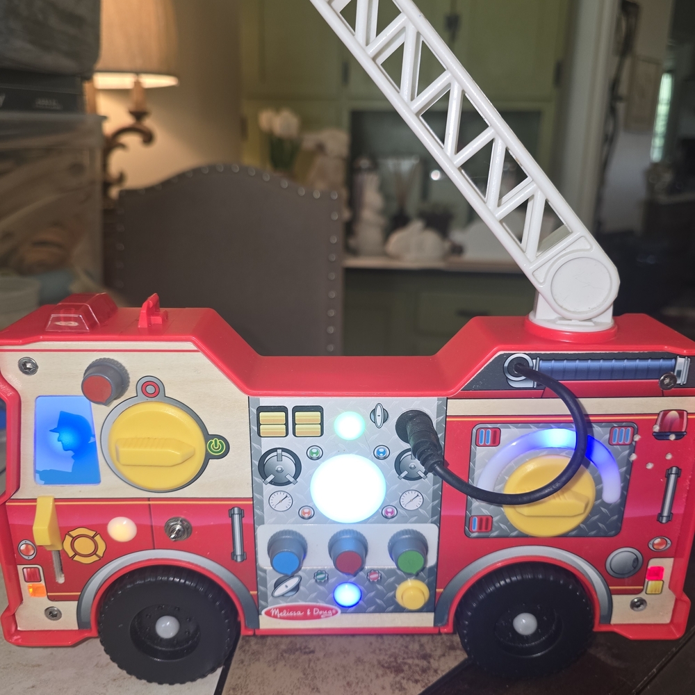 Melissa & Doug Lights & Sounds Fire Truck Activity Board, Busy Board Travel Toy